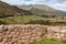 Closeup shot of an ancient wall in the Puka Pukara Inca archaeological complex in Cusco, Peru