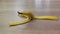 Closeup shot of a banana peel on the floor - a practical joke concept