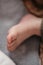 Closeup shot of the bare toes of the newborn baby