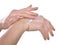 Closeup shot of beautiful female hands  applying moisturiser