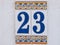 Closeup shot of a beautiful wall number made with ceramic tiles