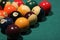 Closeup shot of billiard balls on a green table