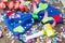 Closeup shot of a blue bowtie and party decorations on a wooden table