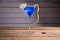 Closeup shot of blue lagoon cocktail on a wooden surface