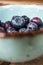 Closeup shot of blueberries in light green bowl