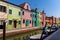 Closeup shot of boats in the water and colorful buildings in Venice, Italy
