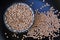 Closeup shot of a bowl of lentils and on a dark surface