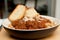 Closeup shot of a bowl of spaghetti with a tasty meatball sauce