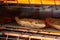 Closeup shot of bread slices in an oven with heat on