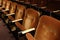 Closeup shot of the brown seats in the theatre hall