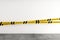 Closeup shot of a caution tape isolated on a white white