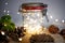 Closeup shot of Christmas tree bumps and lights in a jar on a table