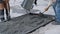 Closeup shot of concrete casting on reinforcing metal bars of a slab on the industrial construction site. Creation of