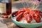 Closeup shot of the cooked lobsters in a plate on the table with blur background