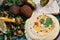 Closeup shot of delicious Arabian meal with hummus and falafel