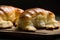 Closeup shot of delicious Argentinian medialunas/croissants on a wooden table