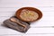 Closeup shot of delicious bean soup with a spicy marinated pepper on a wooden surface