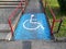 Closeup shot of disable, handicap sign on the road