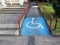 Closeup shot of disable, handicap sign on the road