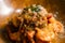 Closeup shot of a dish of gourmet Shrimp Aglio Olio pasta