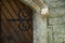 Closeup shot of a door and stonework on a vault in Nunhead cemetery, in London, England