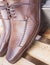 Closeup shot of elegant and beautiful men\'s formal leather brown shoes