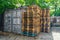 Closeup shot of empty wooden pallets stacked on top of each other outdoors