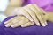 Closeup shot of female hand fingers during a manicure