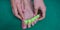 Closeup shot of female hands adjusting a toe separator for a pedicure