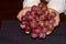 Closeup shot of a female holding in hands grapes