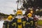 Closeup shot of firefighters with oxygen cylinder in the forest