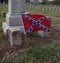 Closeup shot of a Flag of the Confederate States of America at a cemetery in Tennessee, USA