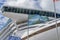 Closeup shot of a flag with Maori greeting meaning welcome beside a cruise ship at Auckland