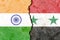 Closeup shot of the flags of India and Syria on a cracked wall