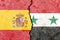 Closeup shot of the flags of Spain and Syria on a cracked wall