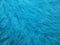 Closeup shot of a fluffy woolen blue fabric