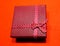 Closeup shot of a gift wrapped in a dotted tape