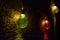 Closeup shot of a green illuminated light bulb on the wall