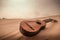 Closeup shot of the guitar on the sand in a desert