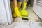 Closeup shot of a hand cleaning up very dirty floor