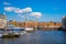 Closeup shot of a harbor and nice buildings on the background