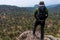 A closeup shot of a Hispanic hiker on top of mount Tlaloc in Mexico