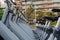 Closeup shot of identical gray bicycles in the street