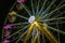 Closeup shot of the illuminated ferris wheel at night in the West Tisbury, USA