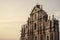 Closeup shot of an impressive facade of ruins of St. Paul's Church in Macau, during the sunset