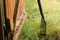 Closeup shot of an iron rake on the grassy ground