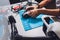 Closeup shot of man working on assembling new surveillance system using quadcopter drone with camera on table with