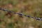 Closeup shot of a metal cord with sharp pointy ends