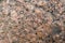 Closeup shot of a mottled texture of a large bright granite stone