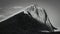Closeup shot mountain peak in black and white